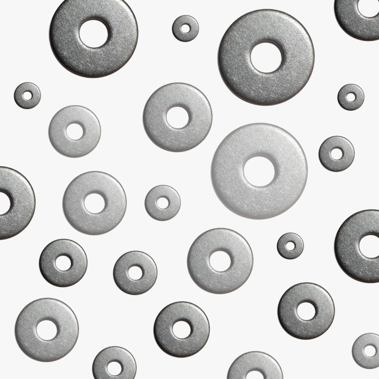Verbindungselemente – minimalistisch und präzise Metallene Unterlegscheiben und Ringe in verschiedenen Größen auf weißem Hintergrund, realistisch und minimalistisch angeordnet.